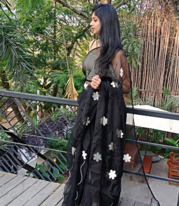 Flawless outdoor makeup look with professional saree draping and elegant hairstyling in Hyderabad by Makeover by Farhaa