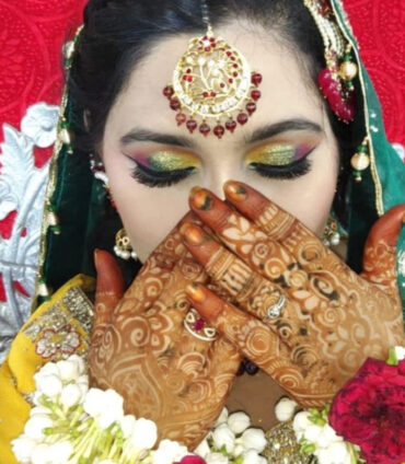 Exquisite Muslim bridal makeup highlighting dramatic eye makeup and traditional look in Hyderabad by Makeover by Farhaa